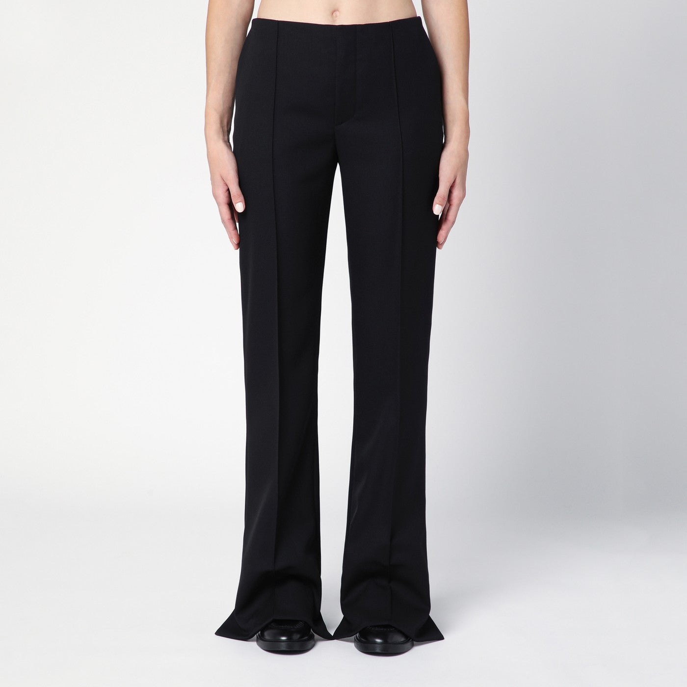 Black asymmetrical wool trousers