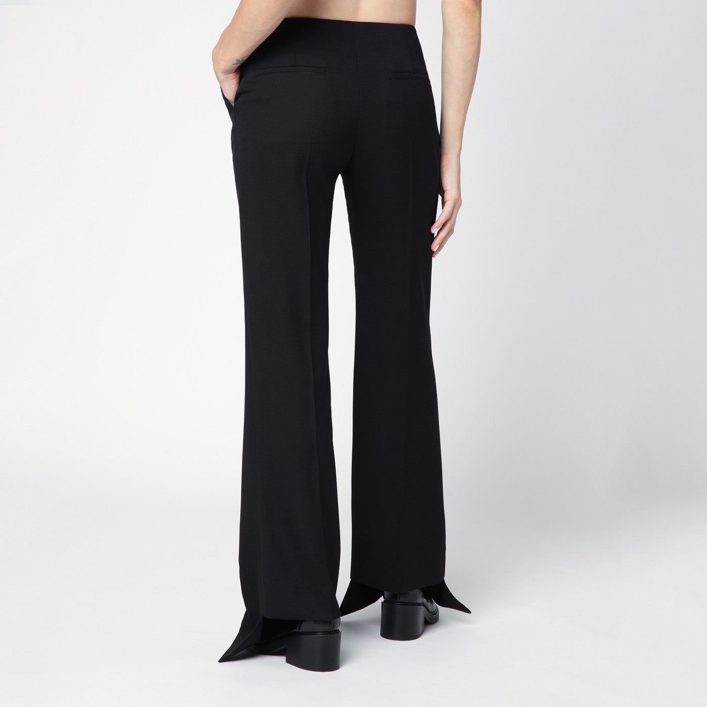 Black asymmetrical wool trousers