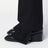Black asymmetrical wool trousers