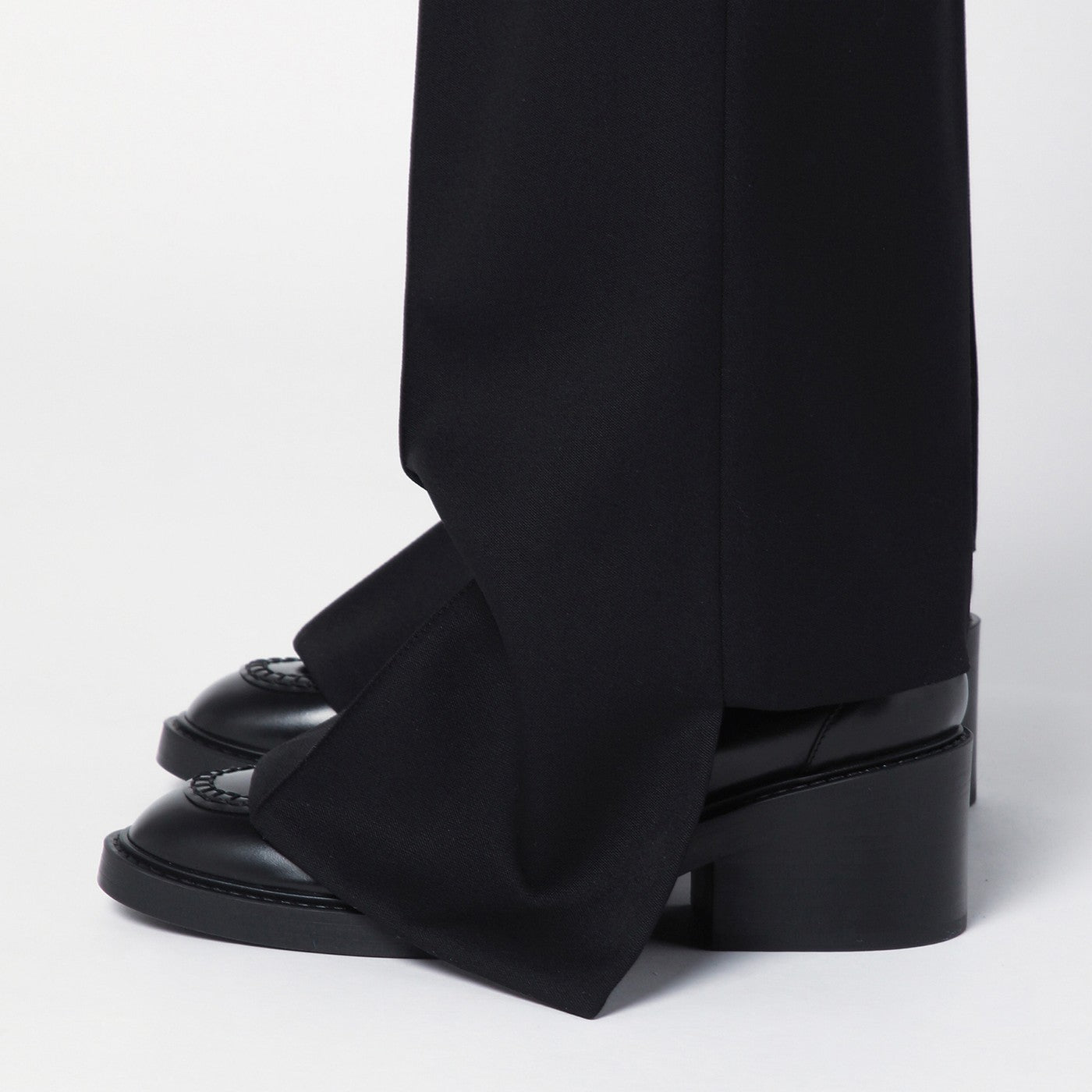 Black asymmetrical wool trousers