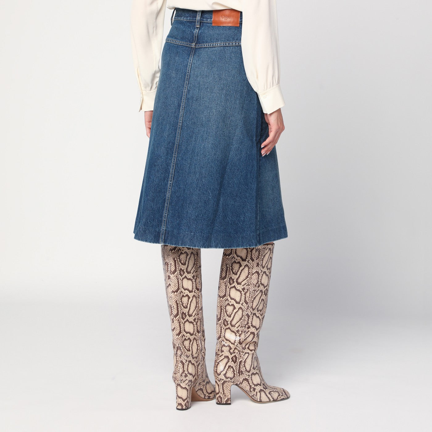 Knee-length skirt in washed blue denim