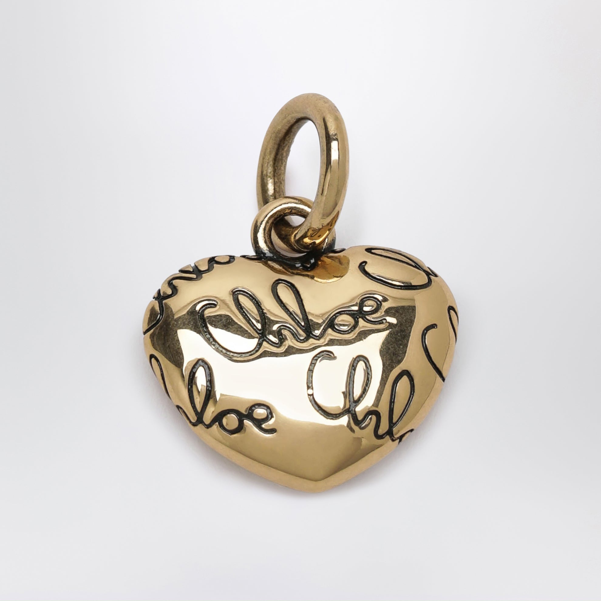 Alphabet heart logo charm in brass, gold