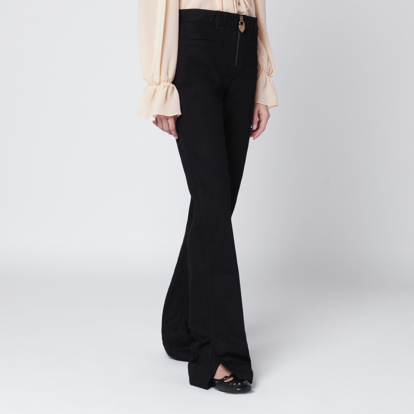 Black slim jeans with charm zip