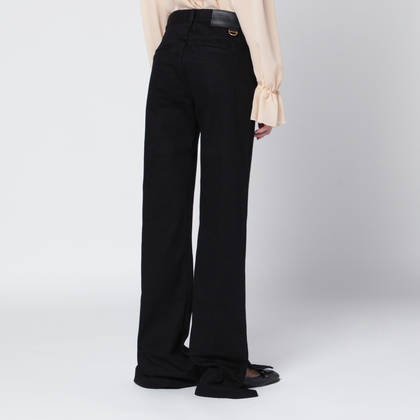 Black slim jeans with charm zip