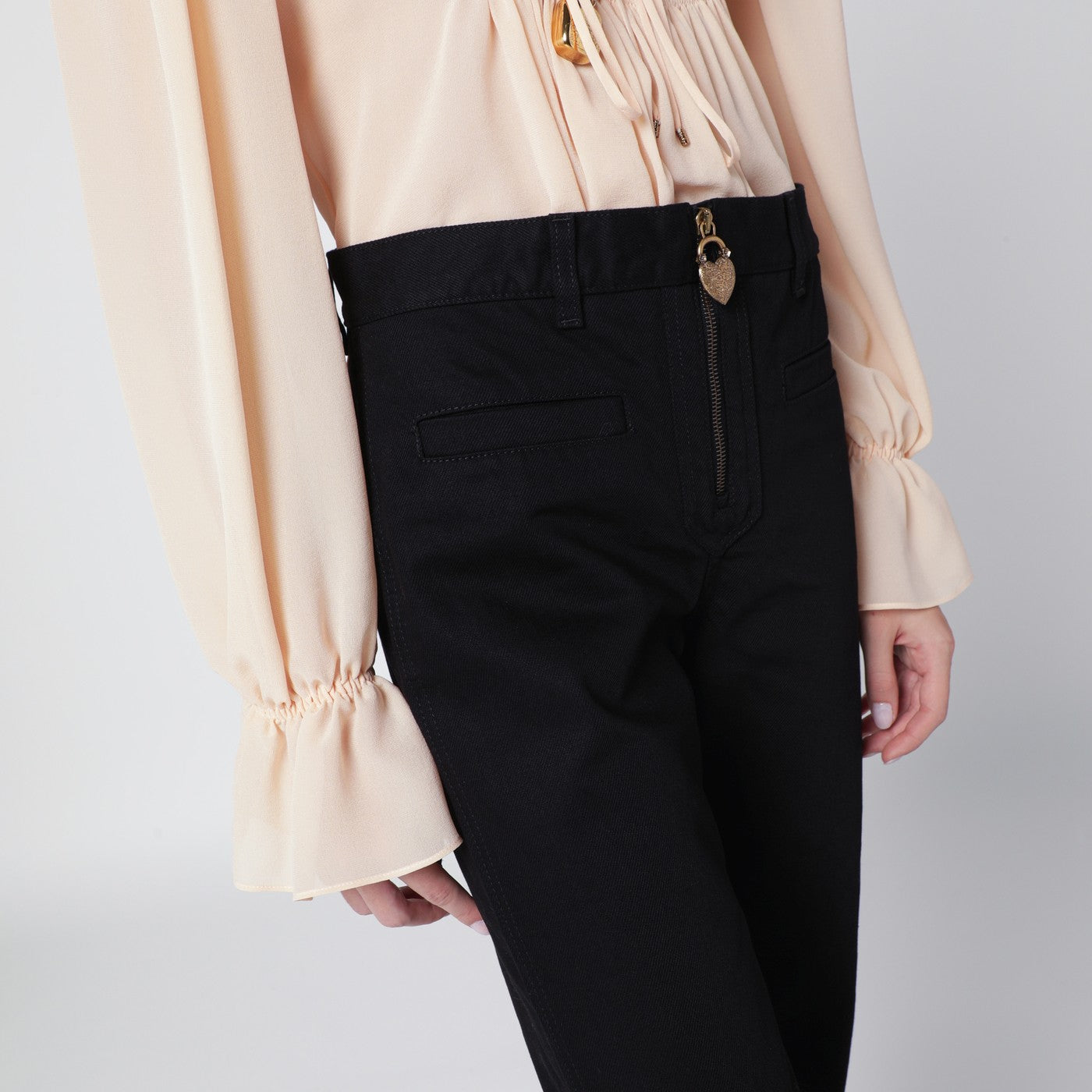 Black slim jeans with charm zip