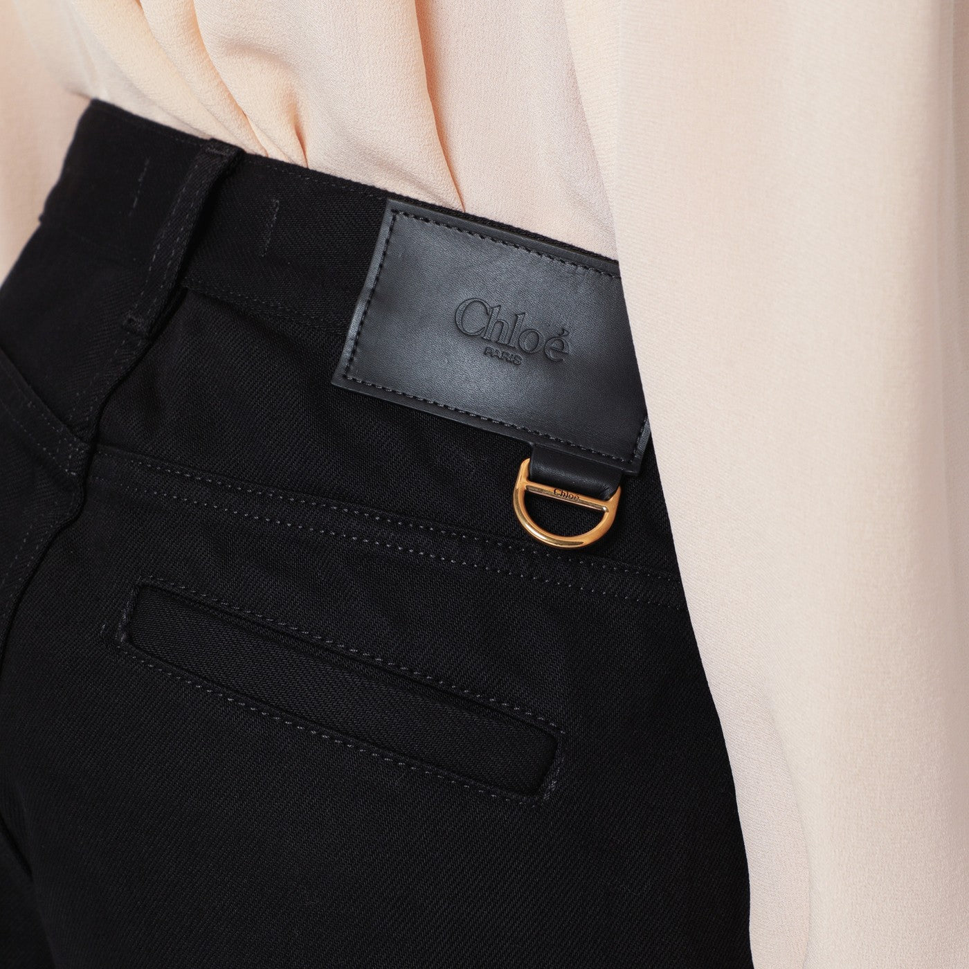 Black slim jeans with charm zip
