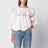 Pink cotton ruffle blouse