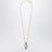 Collana con pendente a bottiglia in ottone oro/argento