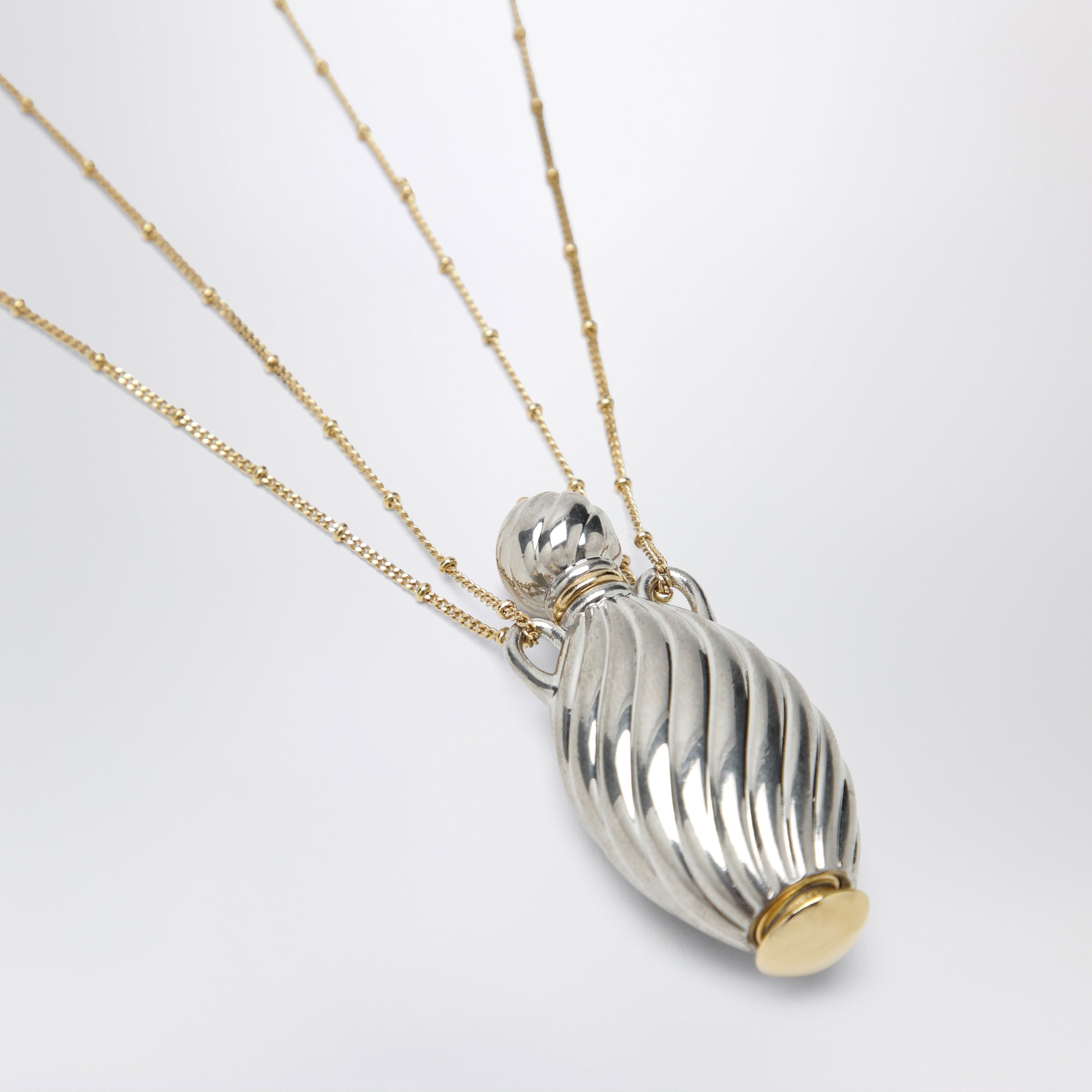 Collana con pendente a bottiglia in ottone oro/argento