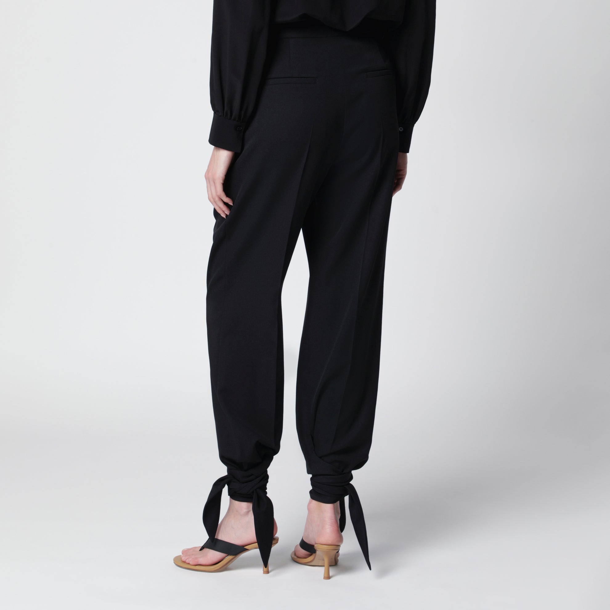 Black pleated fluid crêpe de chine trousers