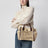 Iconic Tote-Bag aus Raffia mit Lederbesatz in Hot Sand