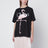 T-shirt ampia nera con logo e stampa fenicottero
