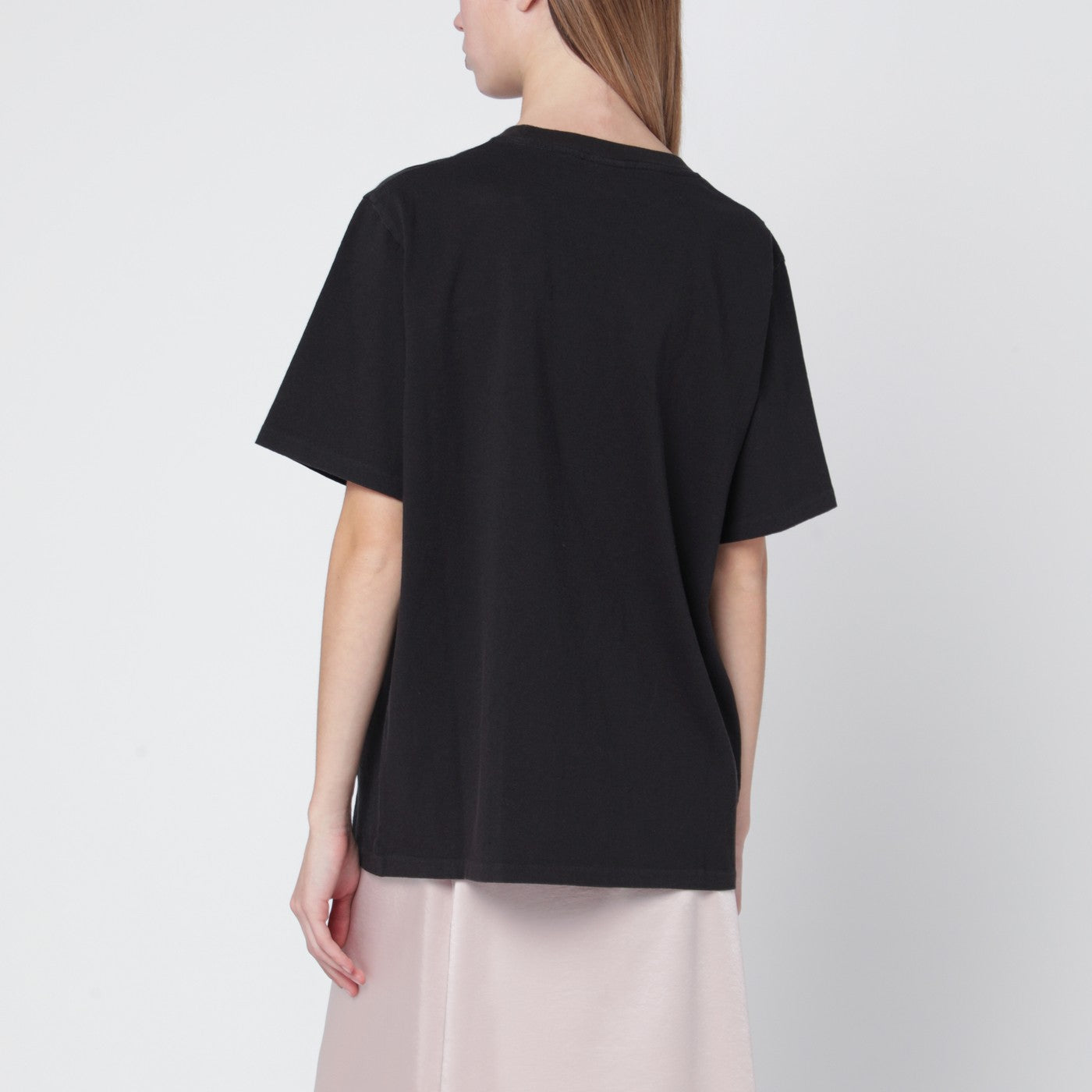 T-shirt ampia nera con logo e stampa fenicottero