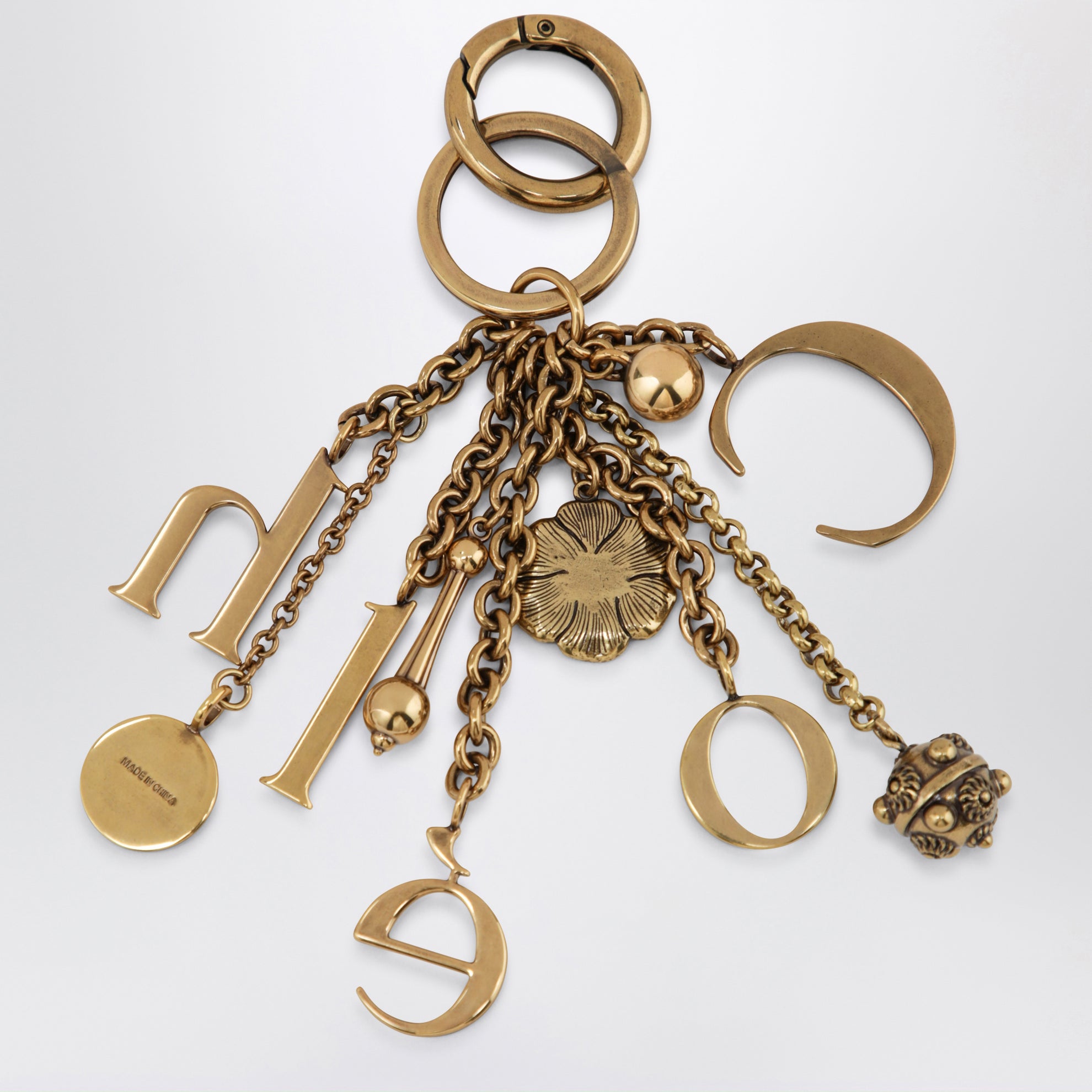 Charm portachiavi Symbols Logo in ottone oro