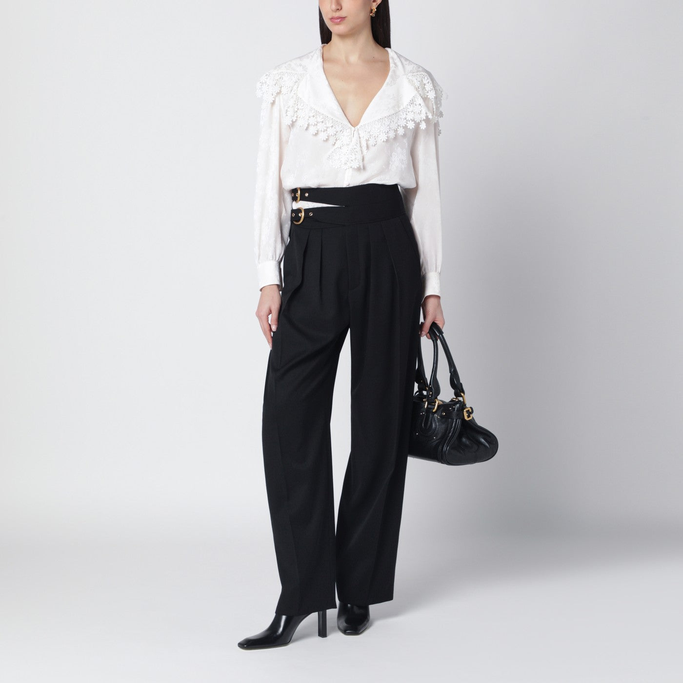 Black trousers with double belt and gold buckles
