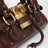 Small brown leather Paddington bag