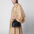 Borsa a spalla piccola Icons con catena in pelle nera