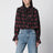 Black ruffled blouse in floral-print silk