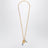 Collier en laiton finition dorée avec charms