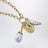 Collier en laiton finition dorée avec charms