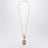 Collier avec pendentif fleur doré/argenté