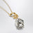 Collier avec pendentif fleur doré/argenté