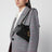 Pochette Mini Paddington Sling noire en cuir nappa