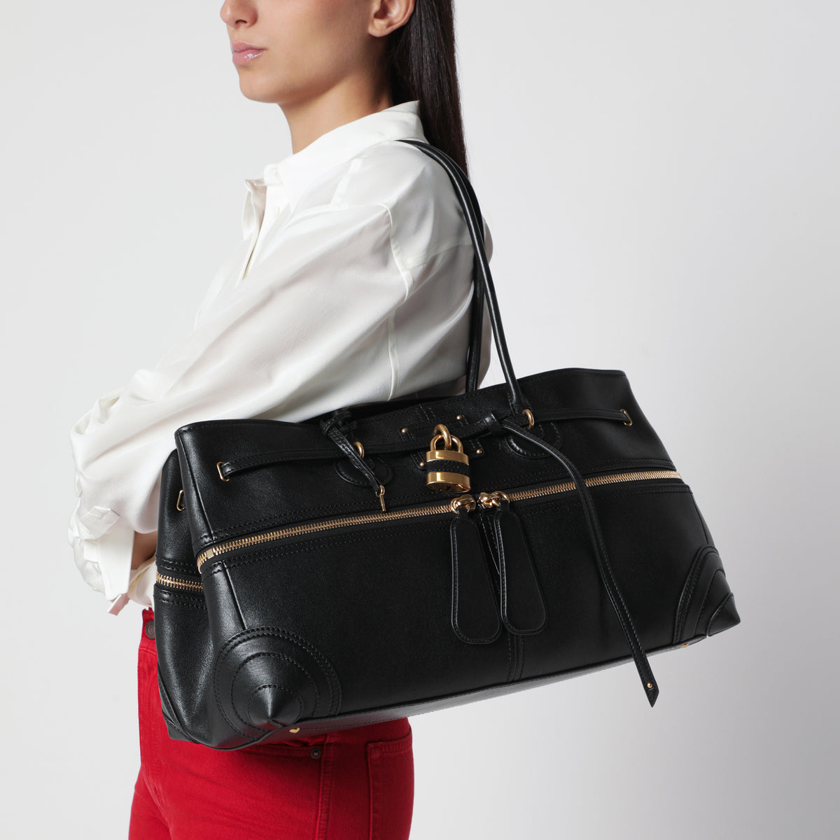 Paddington Sling große schwarze Lammledertasche
