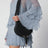 Borsa Saddle Marcie nera in pelle granata