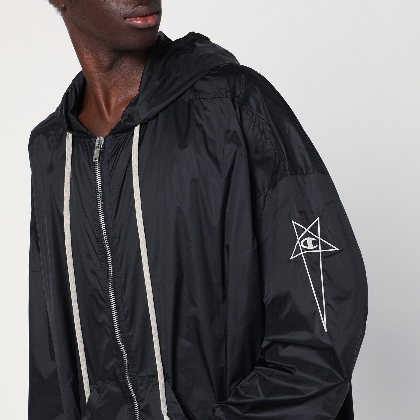 Lightweight black zip jacket in nylon