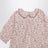 Chemise rose à motif floral