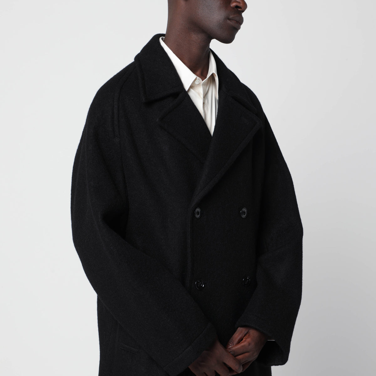 Black double-breasted coat in wool and alpaca