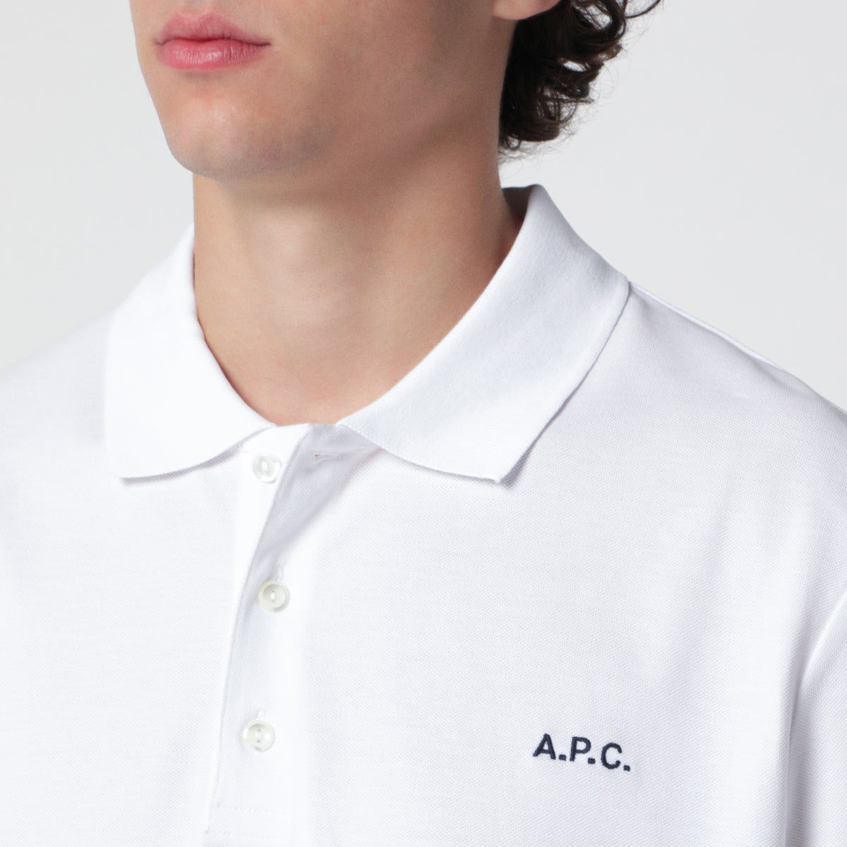 White cotton polo shirt with embroidered logo
