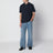 Dark blue cotton polo shirt with embroidered logo