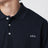Polo blu scura in cotone con ricamo logo