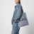 Borsa tote Lou azzurra a righe in cotone