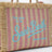 Colette striped straw-effect fabric bag