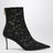 Bottines noires en dentelle et cuir verni