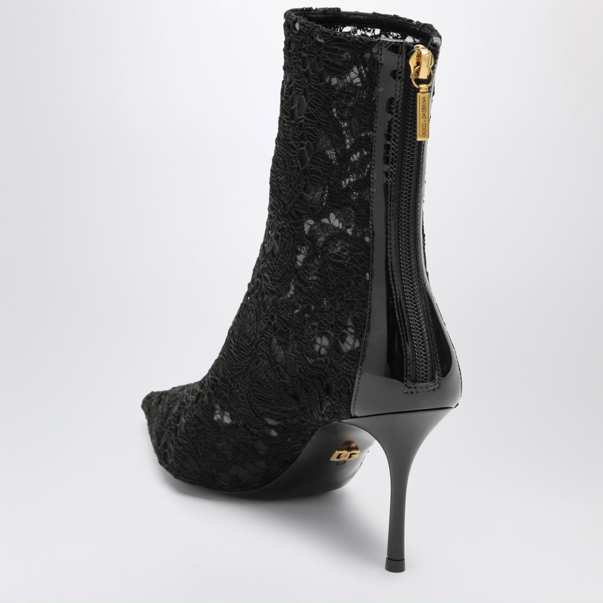 Bottines noires en dentelle et cuir verni