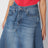 Asymmetric skirt in washed blue denim