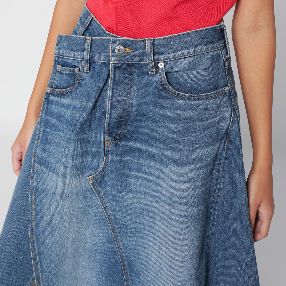 Asymmetric skirt in washed blue denim