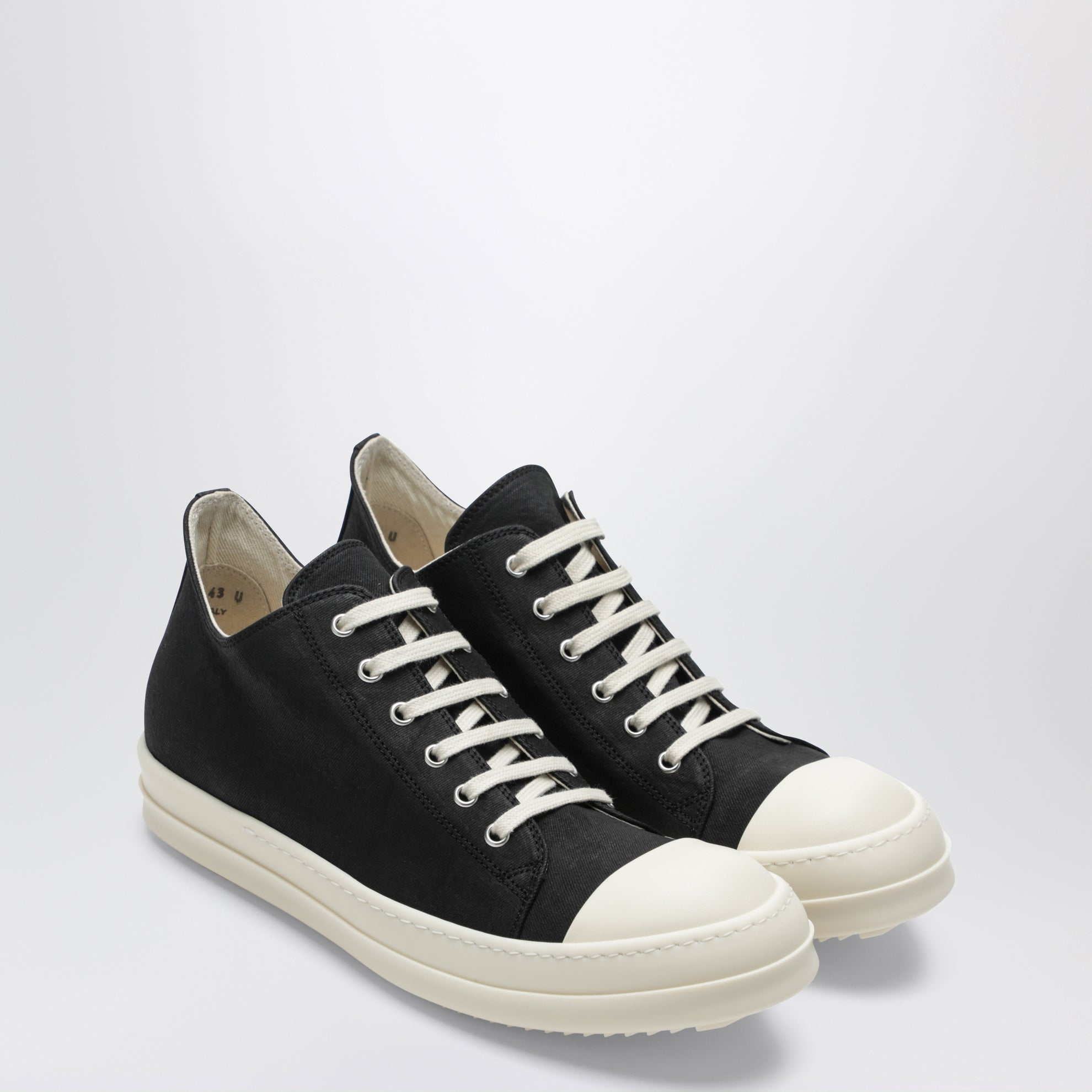 Temple Low Sneakers in black/milk white denim