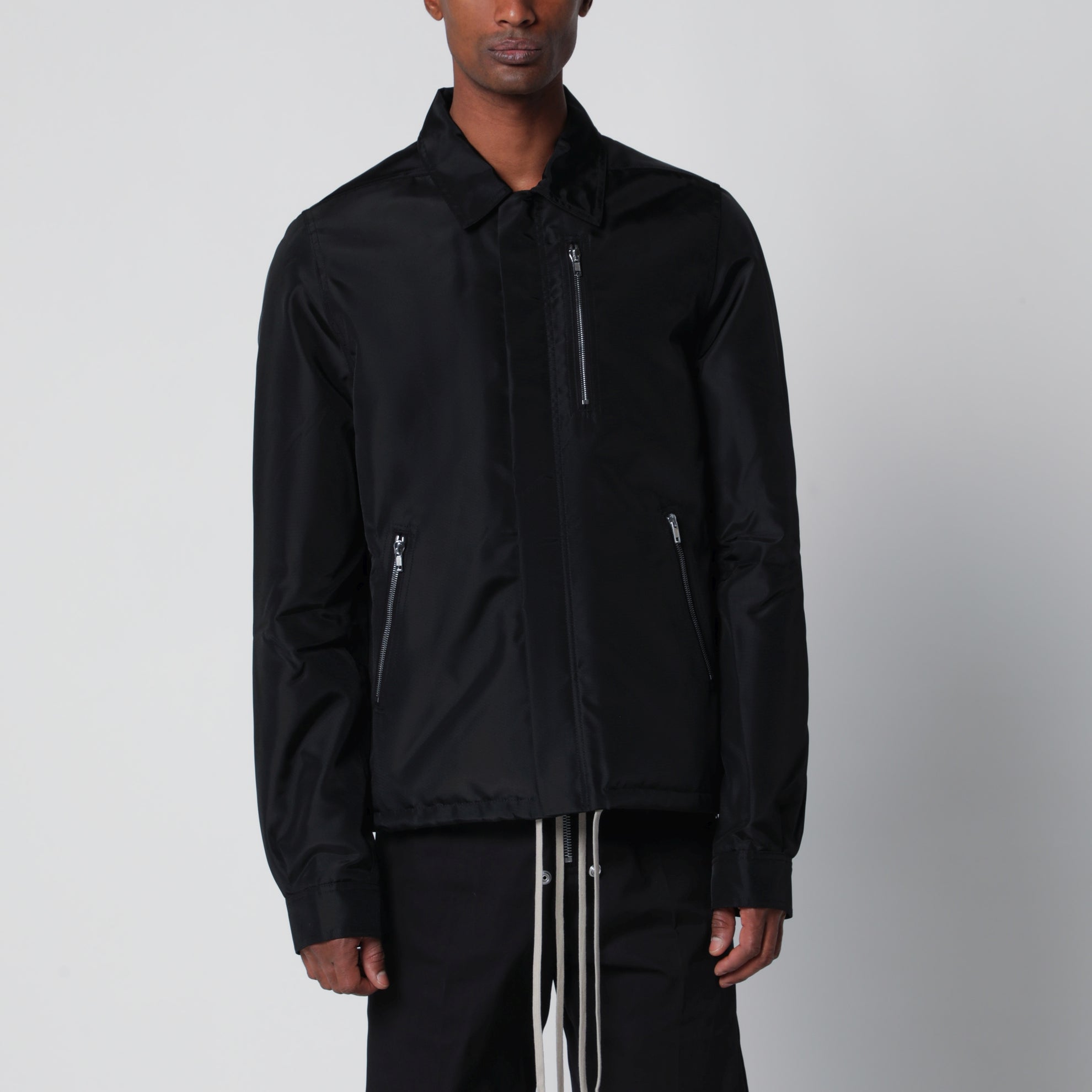 Padded jacket with hidden front zip in black nylon