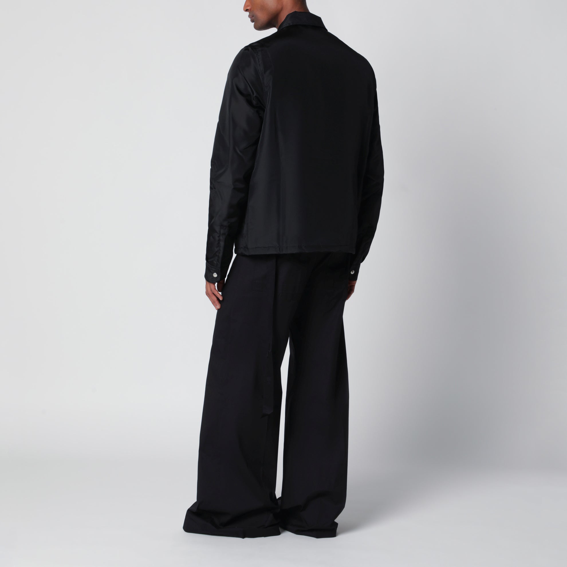 Padded jacket with hidden front zip in black nylon