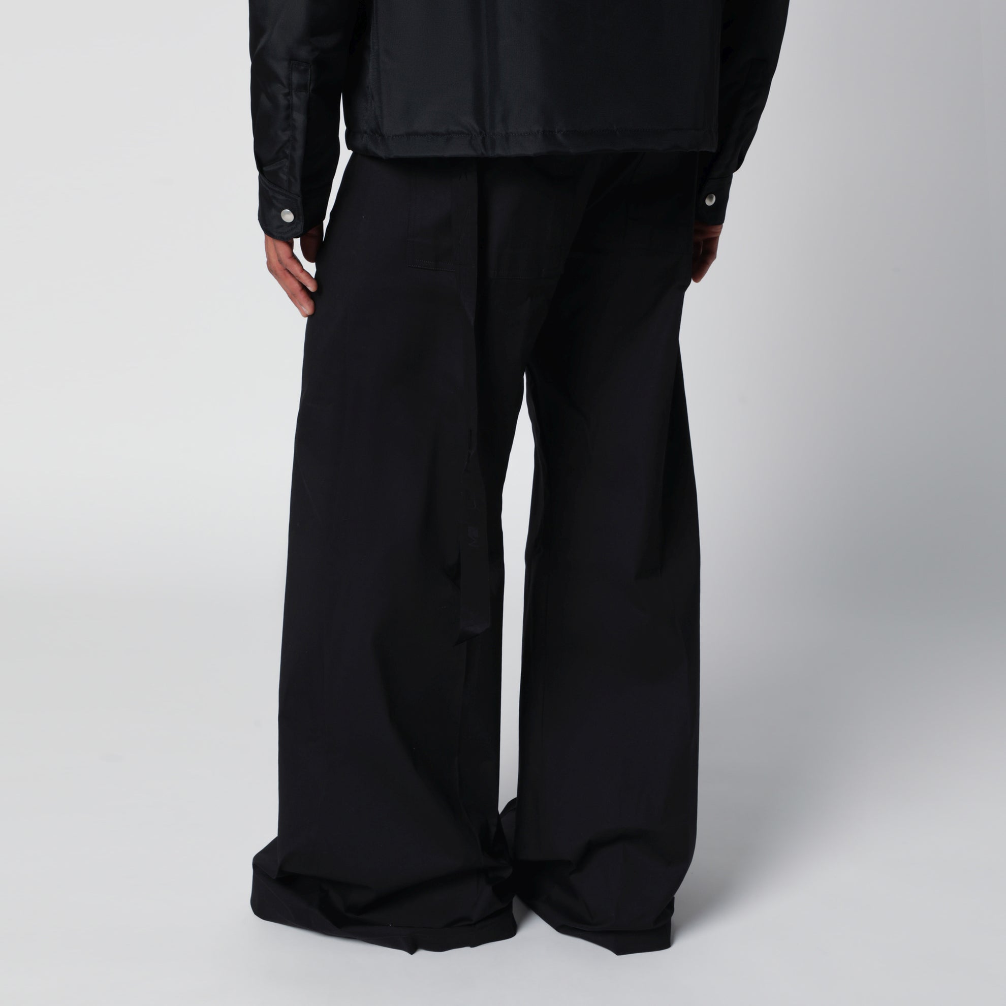 Padded jacket with hidden front zip in black nylon