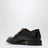 Stringata nera in pelle