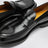 Black leather loafer