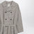 Double-breasted check trench coat