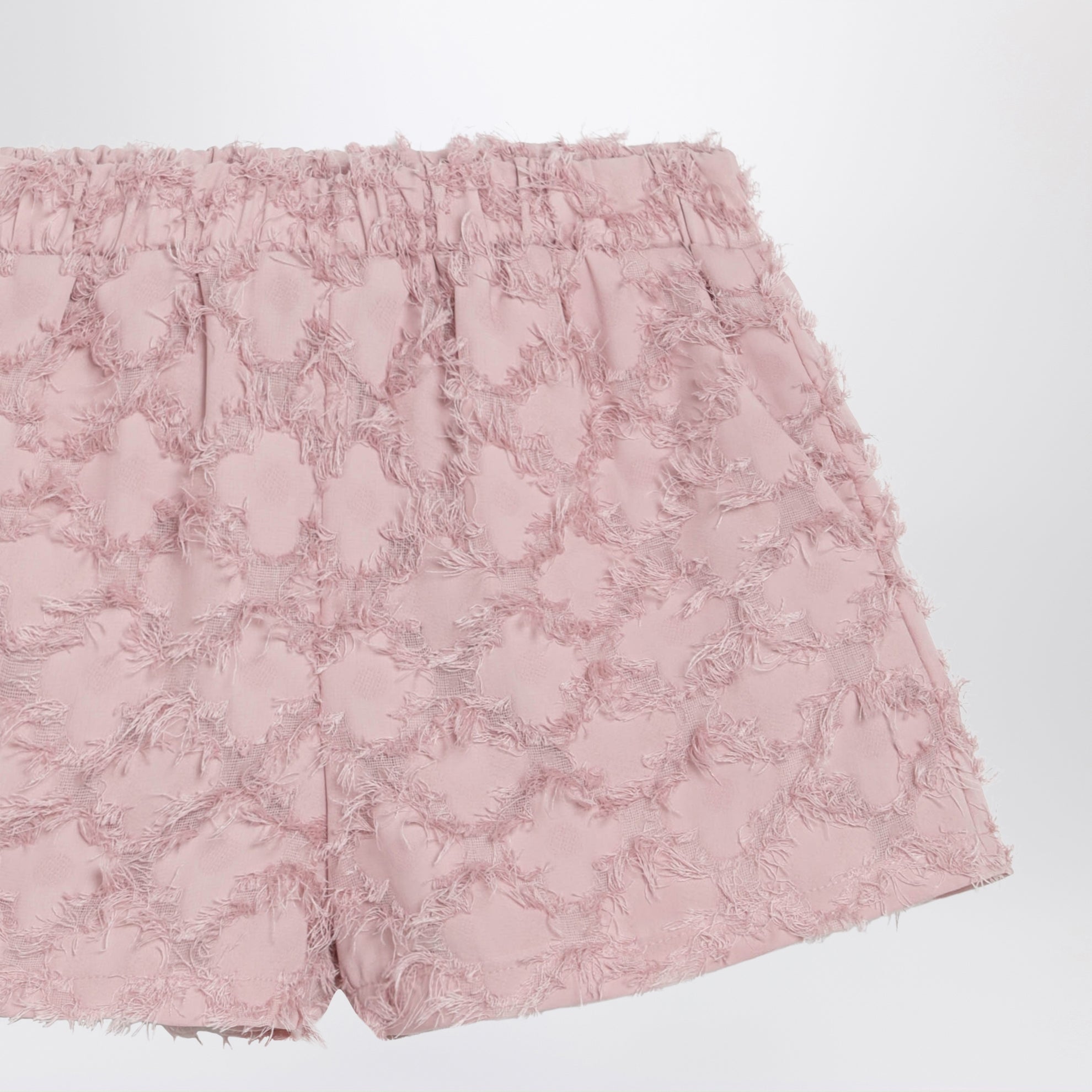 Shorts rosa con motivo con frange