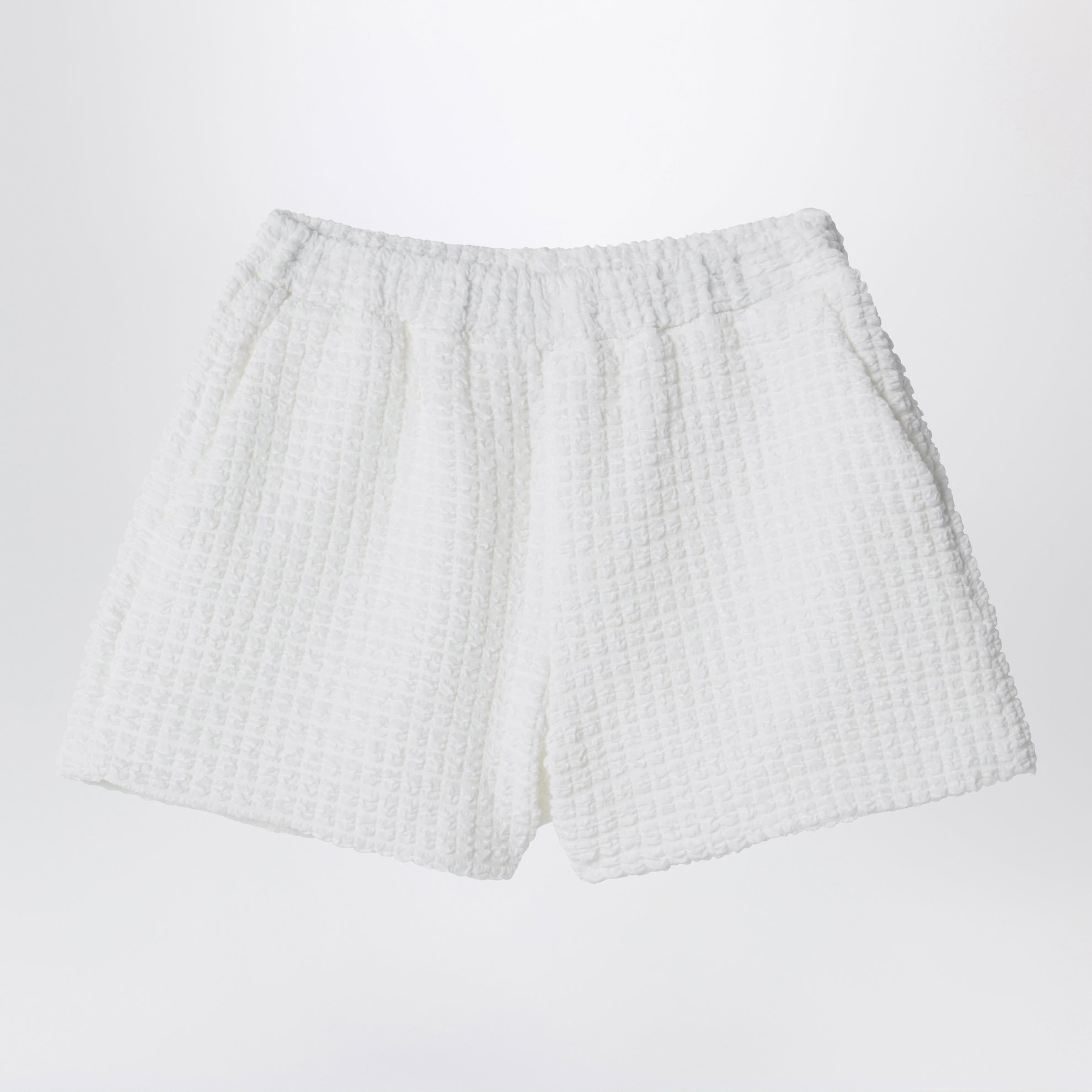 Shorts bianchi in tessuto goffrato